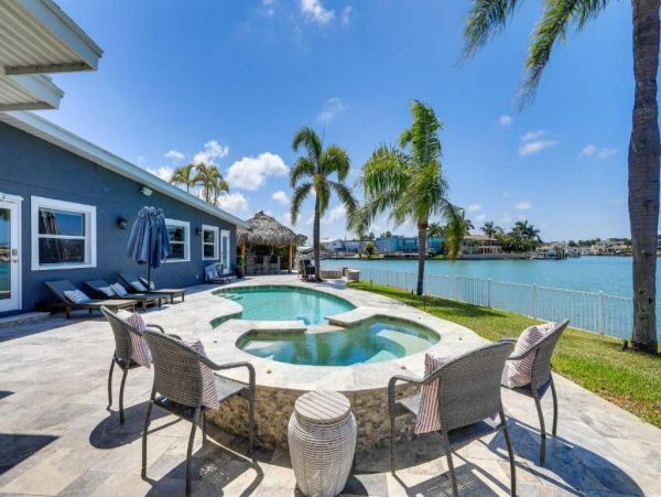 Luxury St. Petersburg Waterfront Vacation Rental 5-Bedroom Home with Pool, Spa & Dock Near Treasure Island
