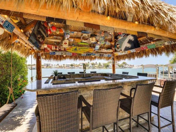 Luxury St. Petersburg Waterfront Vacation Rental 5-Bedroom Home with Pool, Spa & Dock Near Treasure Island