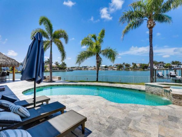 Luxury St. Petersburg Waterfront Vacation Rental 5-Bedroom Home with Pool, Spa & Dock Near Treasure Island