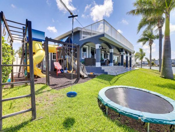 Luxury St. Petersburg Waterfront Vacation Rental 5-Bedroom Home with Pool, Spa & Dock Near Treasure Island