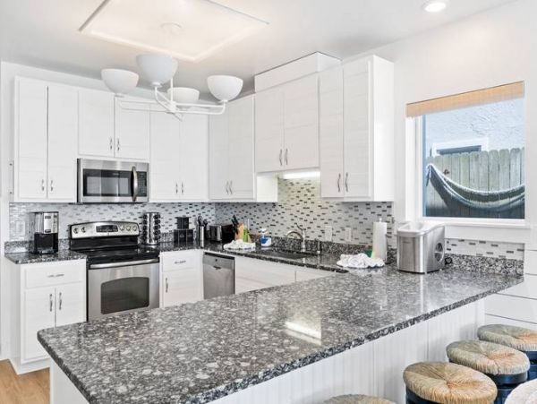 A Direct Beachfront 12 Bedroom Vacation Getaway