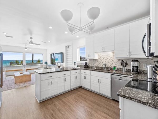 A Direct Beachfront 12 Bedroom Vacation Getaway