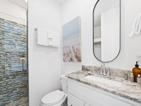 A Direct Beachfront 12 Bedroom Vacation Getaway