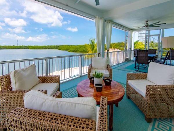 Breathtaking Waterfront Escape with Pool, Tiki Bar & Boat Ramp at Coco Plum