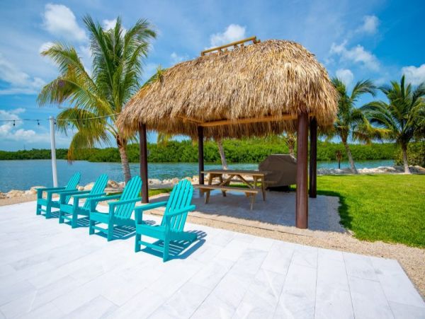 Breathtaking Waterfront Escape with Pool, Tiki Bar & Boat Ramp at Coco Plum