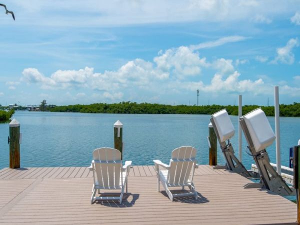 Breathtaking Waterfront Escape with Pool, Tiki Bar & Boat Ramp at Coco Plum