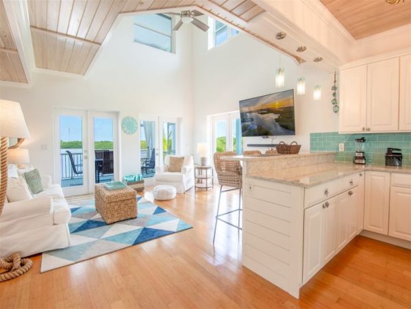 Breathtaking Waterfront Escape with Pool, Tiki Bar & Boat Ramp at Coco Plum