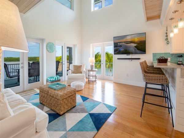 Breathtaking Waterfront Escape with Pool, Tiki Bar & Boat Ramp at Coco Plum
