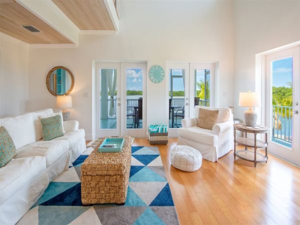 Breathtaking Waterfront Escape with Pool, Tiki Bar & Boat Ramp at Coco Plum