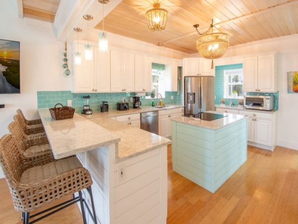 Breathtaking Waterfront Escape with Pool, Tiki Bar & Boat Ramp at Coco Plum