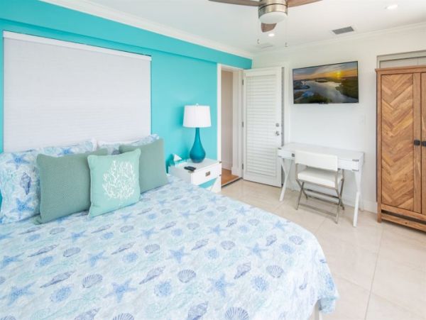 Breathtaking Waterfront Escape with Pool, Tiki Bar & Boat Ramp at Coco Plum