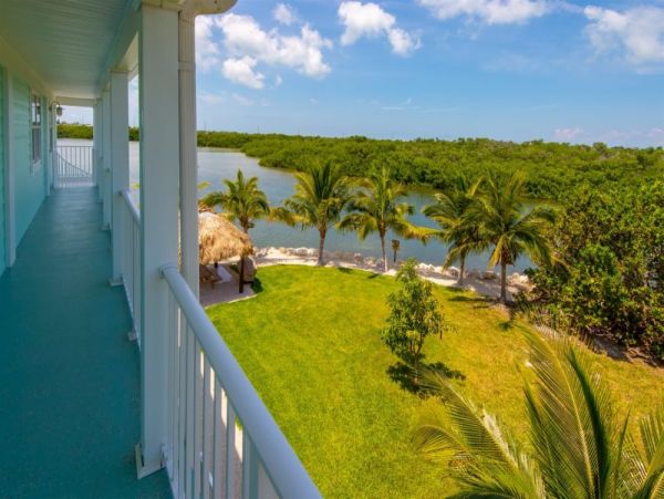 Breathtaking Waterfront Escape with Pool, Tiki Bar & Boat Ramp at Coco Plum