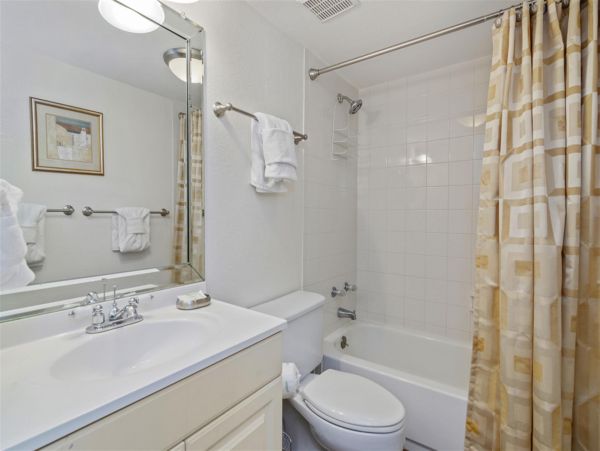 Spacious Two Bedroom-Two Bath Beachfront Unit with Panoramic Ocean Views!