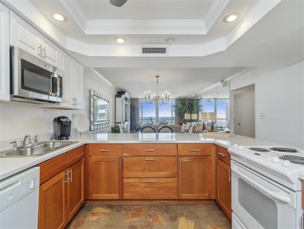 Spacious Two Bedroom-Two Bath Beachfront Unit with Panoramic Ocean Views!