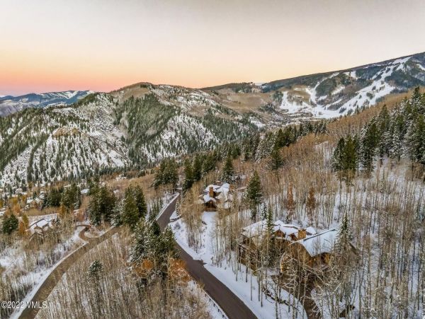 Ski in via Bedstraw and shuttle out Bachelors Gulch Residence