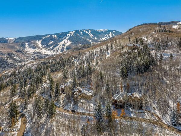 Ski in via Bedstraw and shuttle out Bachelors Gulch Residence