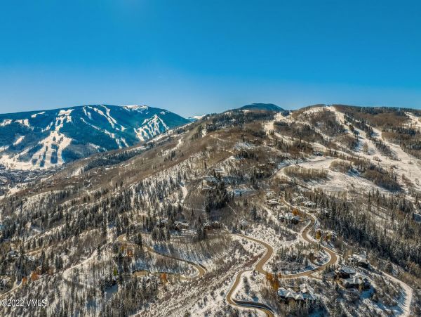 Ski in via Bedstraw and shuttle out Bachelors Gulch Residence