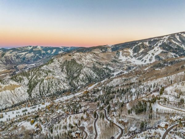 Ski in via Bedstraw and shuttle out Bachelors Gulch Residence