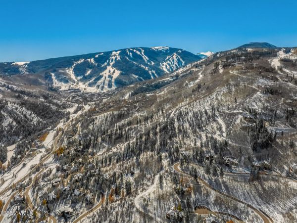 Ski in via Bedstraw and shuttle out Bachelors Gulch Residence