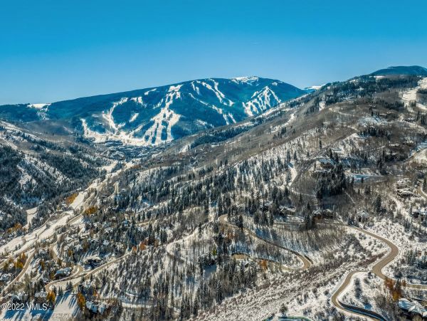 Ski in via Bedstraw and shuttle out Bachelors Gulch Residence