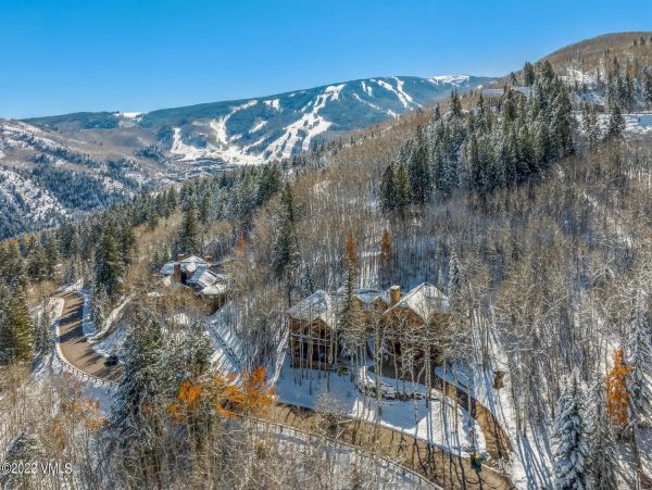 Ski in via Bedstraw and shuttle out Bachelors Gulch Residence