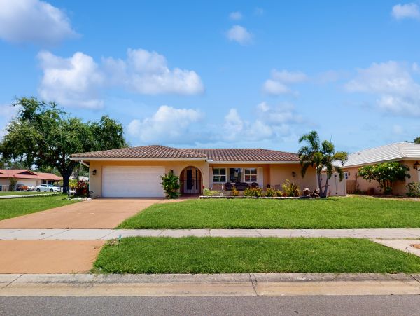 Dog-Friendly Four Bedroom Vacation Rental - Sarasota Home with Pool, Lanai & Backyard