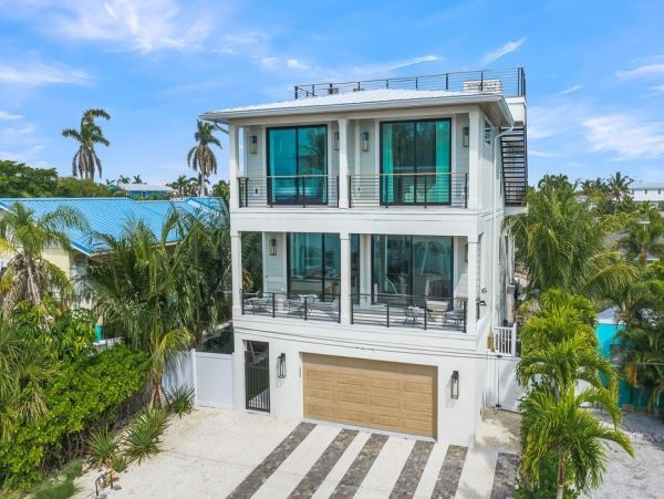 Anna Maria Island Luxury Vacation Rental  7-Bed Gulf Coast Villa with Pool & Rooftop Views