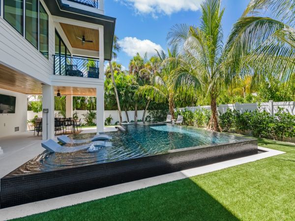 Luxury Holmes Beach Rental Walk to Beach & Rooftop Views