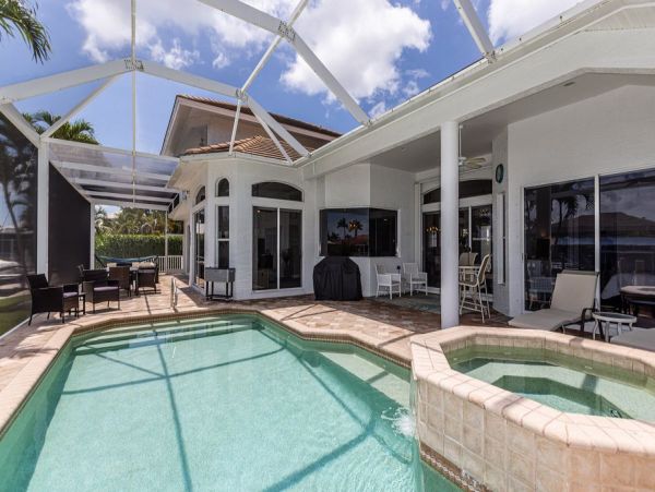 Waterfront Vacation Rental - Luxury Coastal Home with Pool & Hot Tub