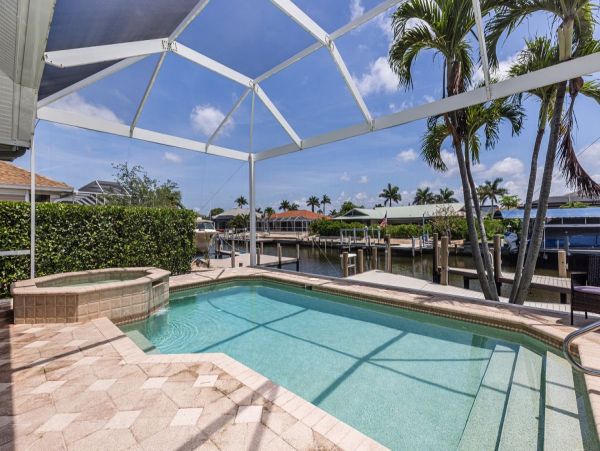 Waterfront Vacation Rental - Luxury Coastal Home with Pool & Hot Tub