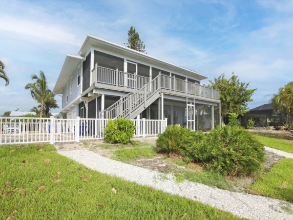 Sanibel Canal Front 4 Bedroom Vacation Rental Dock & Pool