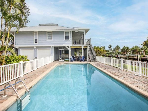 Sanibel Canal Front 4 Bedroom Vacation Rental Dock & Pool