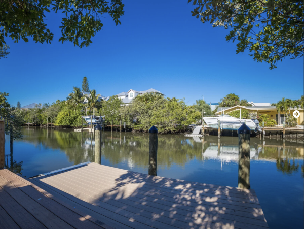 Anna Maria Island Vacation Rental with Private Canal Dock - Luxury North End Coastal Home