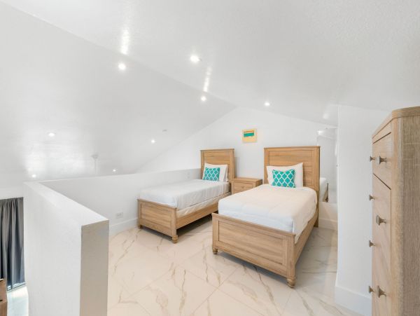 Oceanfront Cayman Island Vacation Villa One Bedroom + Loft