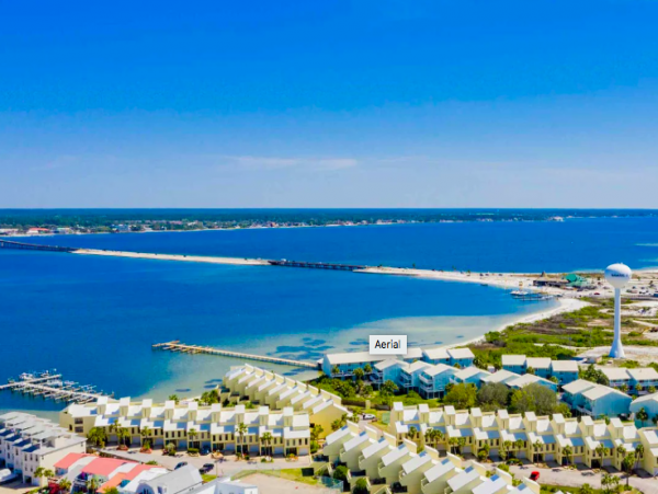 Beautiful 4 Bedroom Townhouse with Shared pool , steps from beach & pet friendly