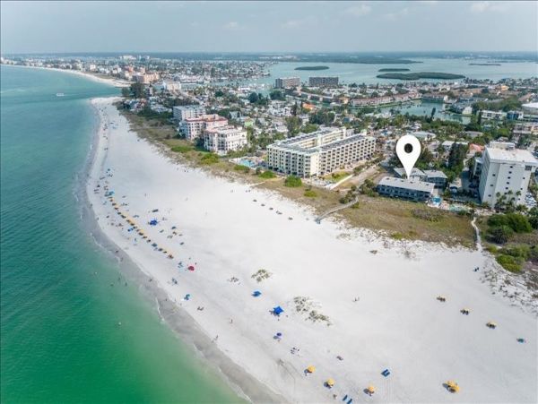 Incredible one-of-a-kind Beachfront Corner Unit in Treasure Island
