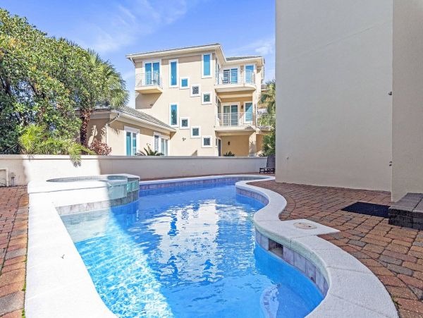 Incredible Luxury Home with Pool in a Gated Gulf Front Community