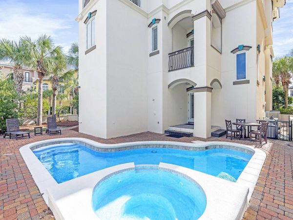 Incredible Luxury Home with Pool in a Gated Gulf Front Community