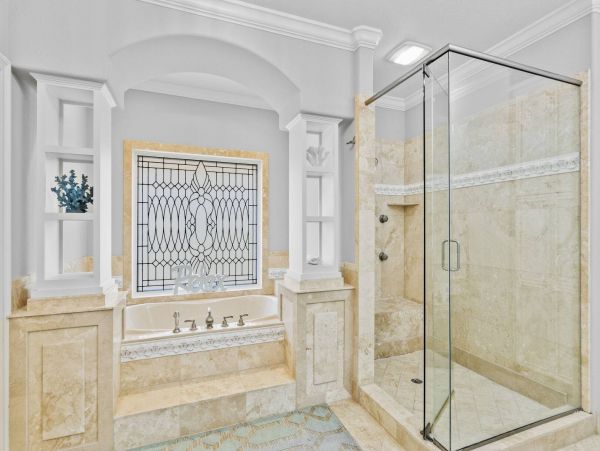 Incredible Luxury Home with Pool in a Gated Gulf Front Community