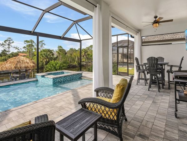 Luxury Canal Front Home with Caged Pool in Cape Coral