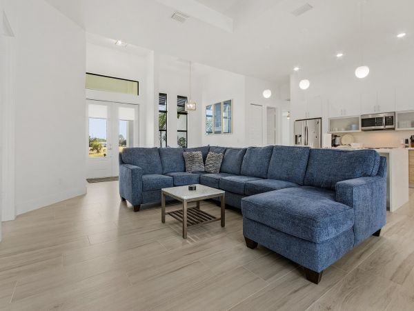 Luxury Canal Front Home with Caged Pool in Cape Coral