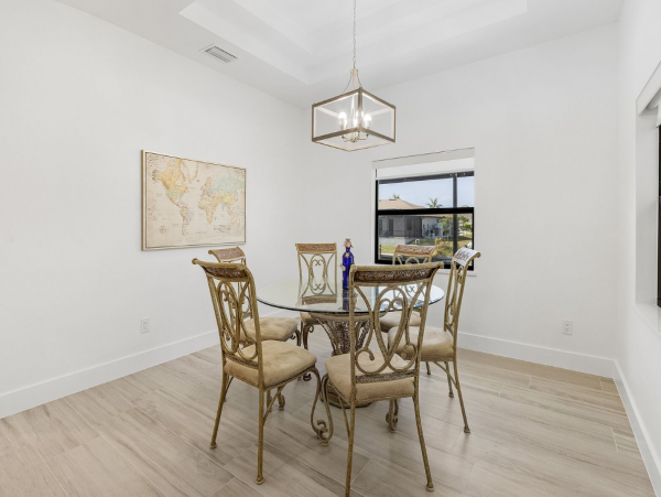 Luxury Canal Front Home with Caged Pool in Cape Coral