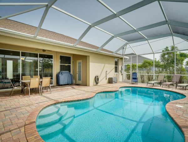 Cape Coral Spacious Four Bedroom Home with Caged Pool