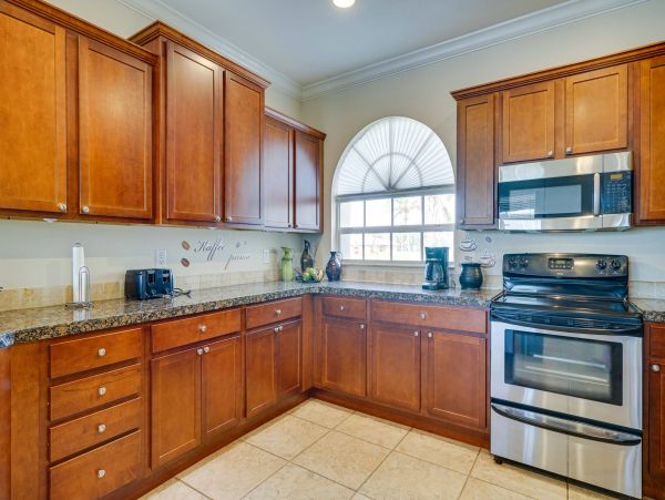 Cape Coral Spacious Four Bedroom Home with Caged Pool