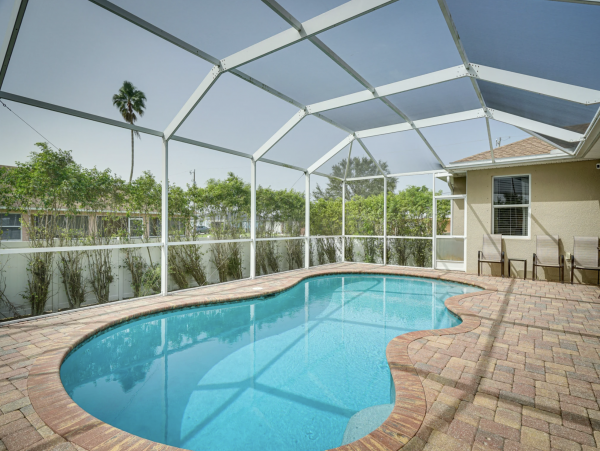 Cape Coral Spacious Four Bedroom Home with Caged Pool