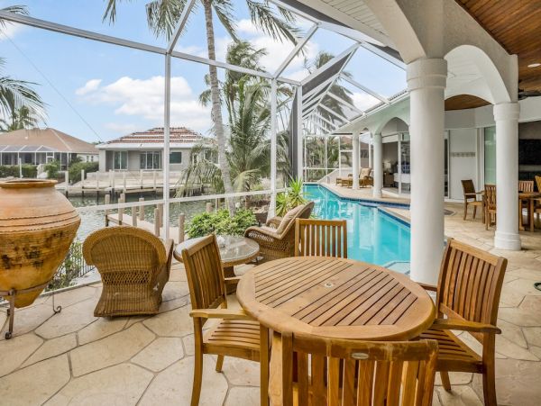 Marco Island Canal Front Three Bedroom Vacation Rental with Caged Pool