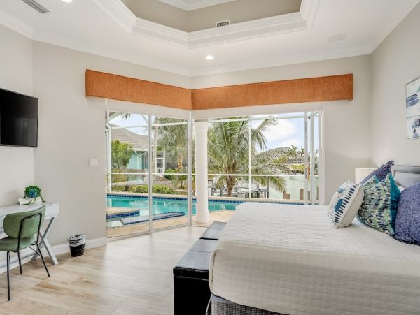 Marco Island Canal Front Three Bedroom Vacation Rental with Caged Pool