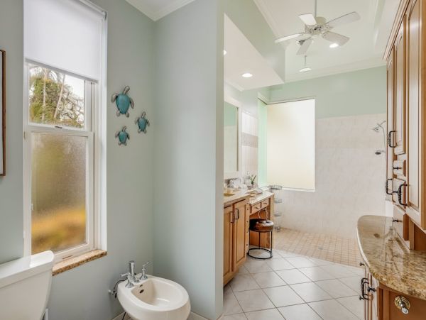 Marco Island Canal Front Three Bedroom Vacation Rental with Caged Pool