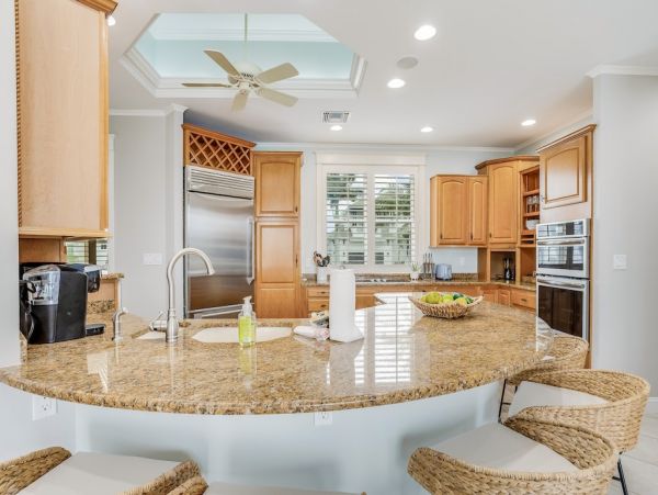 Marco Island Canal Front Three Bedroom Vacation Rental with Caged Pool