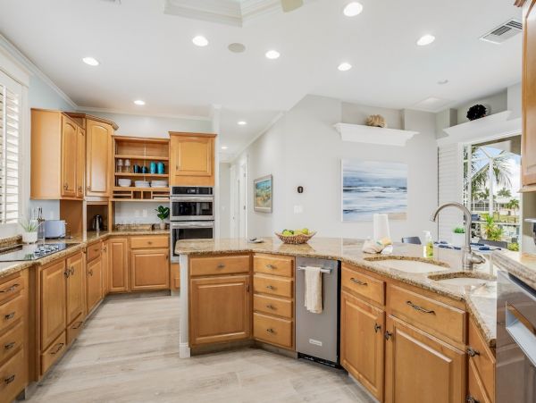 Marco Island Canal Front Three Bedroom Vacation Rental with Caged Pool